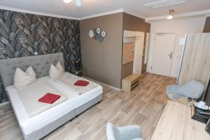 Postel nebo postele na pokoji v ubytování Second Home Hotel