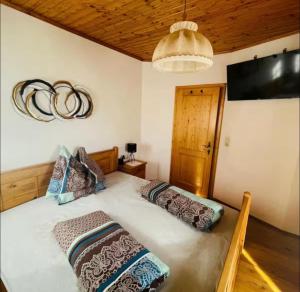 Postel nebo postele na pokoji v ubytování Haus Stabentheiner
