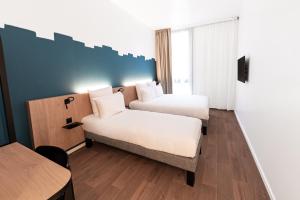 B&B HOTEL Geneva Airport客房内的一张或多张床位