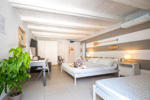 Postel nebo postele na pokoji v ubytování B&B A Portata di Mare