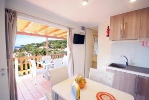 Kuchyň nebo kuchyňský kout v ubytování Camping Village Scaglieri
