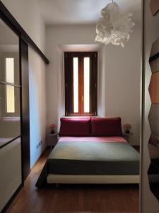Letto o letti in una camera di Fluère - Via Riva Reno