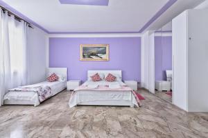 Postel nebo postele na pokoji v ubytování Venice Mahdi Apartment