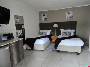 Giường trong phòng chung tại BoniM Guesthouse - aka Magisha Guesthouse