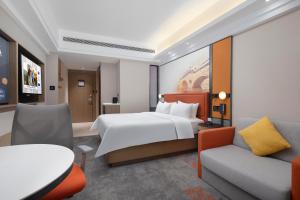 Voodi või voodid majutusasutuse Hampton by Hilton Chengdu Wuhou Waishuannan toas