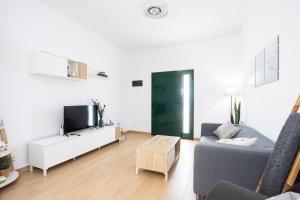 TV a/nebo společenská místnost v ubytování Casa Iraría