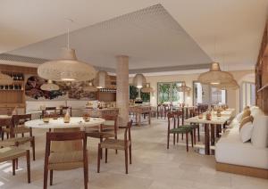 a dining room with tables and chairs and a unintention at Palácio de Tavira, a Small Luxury Hotel of the World in Tavira