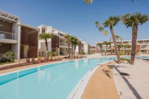 Πισίνα στο ή κοντά στο Wave Island Torre B23