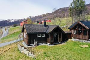 an overhead view of a house on a hill at Cottage Yard - cozy Cabin in Geilo