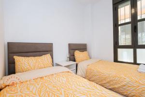 Posteľ alebo postele v izbe v ubytovaní Apartment in heart of Malaga - TCM