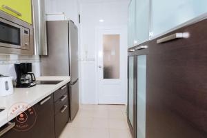 Kuchyňa alebo kuchynka v ubytovaní Apartment in heart of Malaga - TCM