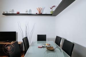 Televízia a/alebo spoločenská miestnosť v ubytovaní Apartment in heart of Malaga - TCM