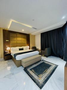 Postel nebo postele na pokoji v ubytování De Palms Hotel Port Harcourt + 5 fotografií