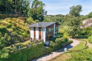 an aerial view of a house with a garden at Stylish villa & spectacular views! - Villa La Rocca in Arona