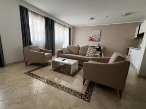 Posezení v ubytování Apartment Zevs Bečići