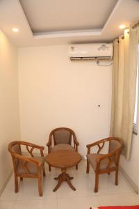 Posezení v ubytování Hotel Aman Inn