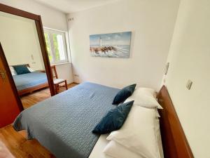 Posteľ alebo postele v izbe v ubytovaní Apartments Grbic