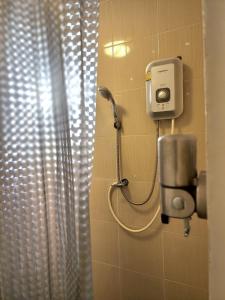 a shower in a bathroom with a shower curtain at Chilli Hotel&Restaurant in Ko Samed +74 photos