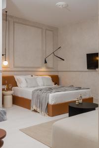 Letto o letti in una camera di Luxury Suites by Lato