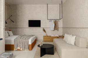 Letto o letti in una camera di Luxury Suites by Lato