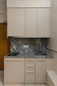 Cucina o angolo cottura di Luxury Suites by Lato
