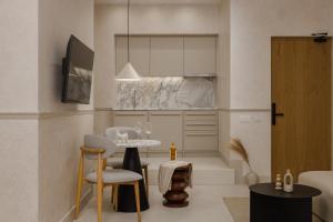 TV o dispositivi per l'intrattenimento presso Luxury Suites by Lato