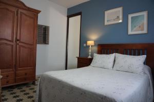 Postel nebo postele na pokoji v ubytování Montserrat Casa del Mar