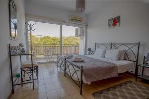 Postel nebo postele na pokoji v ubytování 1-2BD Beach Apartments