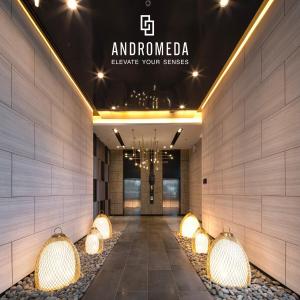 a lobby of a hotel with lights on the wall at Luxury Sea View High Floor Best Stay in Pattaya South