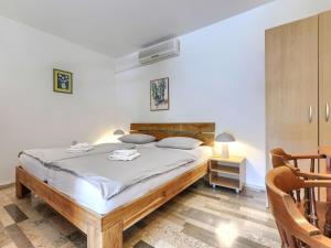 Postel nebo postele na pokoji v ubytování Holiday Home Margit by Interhome
