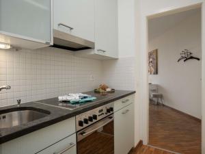 Kuchyň nebo kuchyňský kout v ubytování Apartment Double Room Classic-5 by Interhome + 14 fotografií