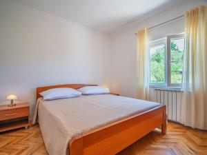 Postel nebo postele na pokoji v ubytování Apartment Olga-2 by Interhome