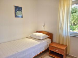 Postel nebo postele na pokoji v ubytování Apartment Olga-2 by Interhome