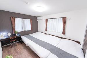 Ένα ή περισσότερα κρεβάτια σε δωμάτιο στο KR family terrace