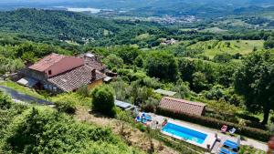 an aerial view of a house and a swimming pool at Casa di Penna in Barberino di Mugello