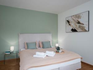 Katil atau katil-katil dalam bilik di Apartment Junior Suite Classic-23 by Interhome