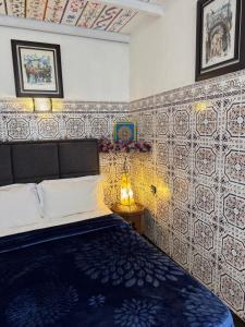 Letto o letti in una camera di Riad Radia