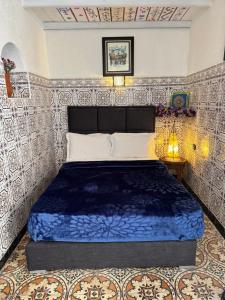 Letto o letti in una camera di Riad Radia