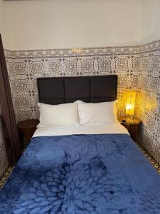 Letto o letti in una camera di Riad Radia