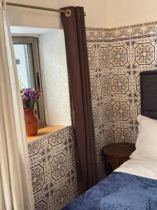 Letto o letti in una camera di Riad Radia