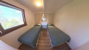 a room with two beds and a window at Tigullio Camping & Resort in Sestri Levante +36 photos