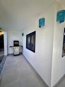 TV a/nebo společenská místnost v ubytování Private Villa with Pool & Ocean Views Las Terrenas