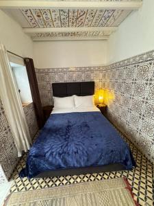 Letto o letti in una camera di Riad Radia