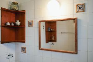 a bathroom with a mirror and a shower at L'Azure 24 - Protaras in Paralimni +32 photos