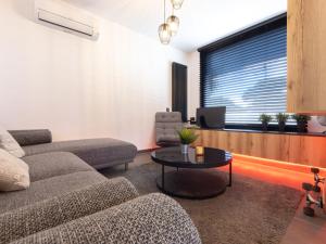 a living room with a couch and a table at Holiday Home El Aviador by Interhome in Cambrils