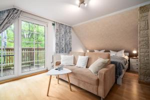 Postel nebo postele na pokoji v ubytování Ferienwohnung Seebusch