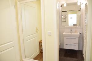 Ein Badezimmer in der Unterkunft Kampstraße 9, W2, GB3