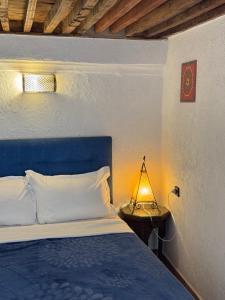 Letto o letti in una camera di Riad Radia