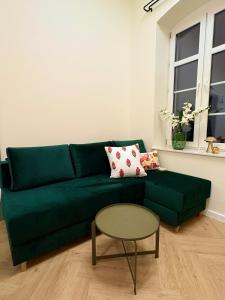 Posezení v ubytování Apartament Frombork Łempicka