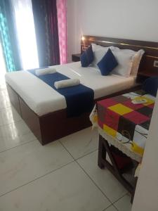 Hotel Samudra Tara客房内的一张或多张床位